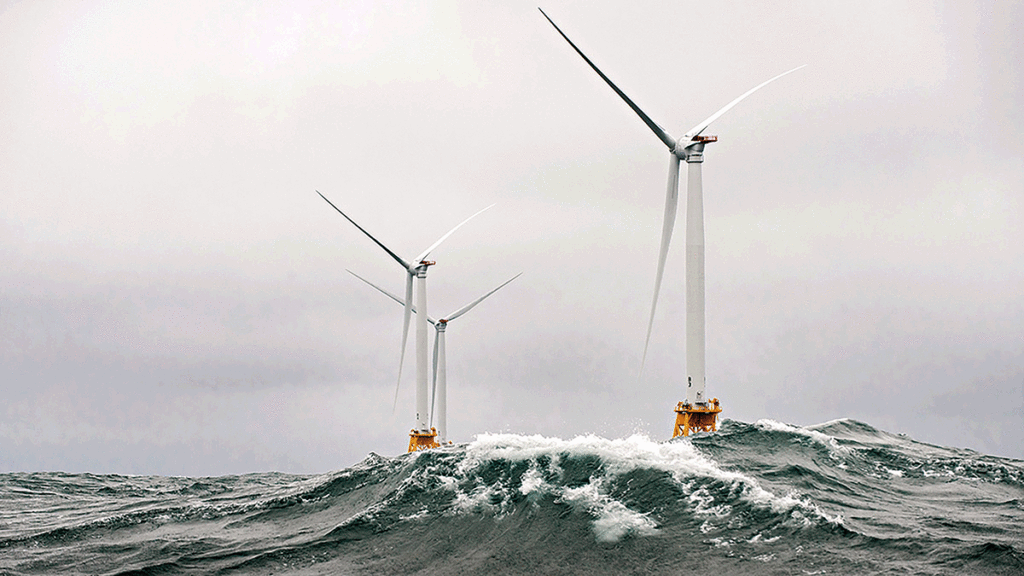 Moinhos de energia eólica no mar.